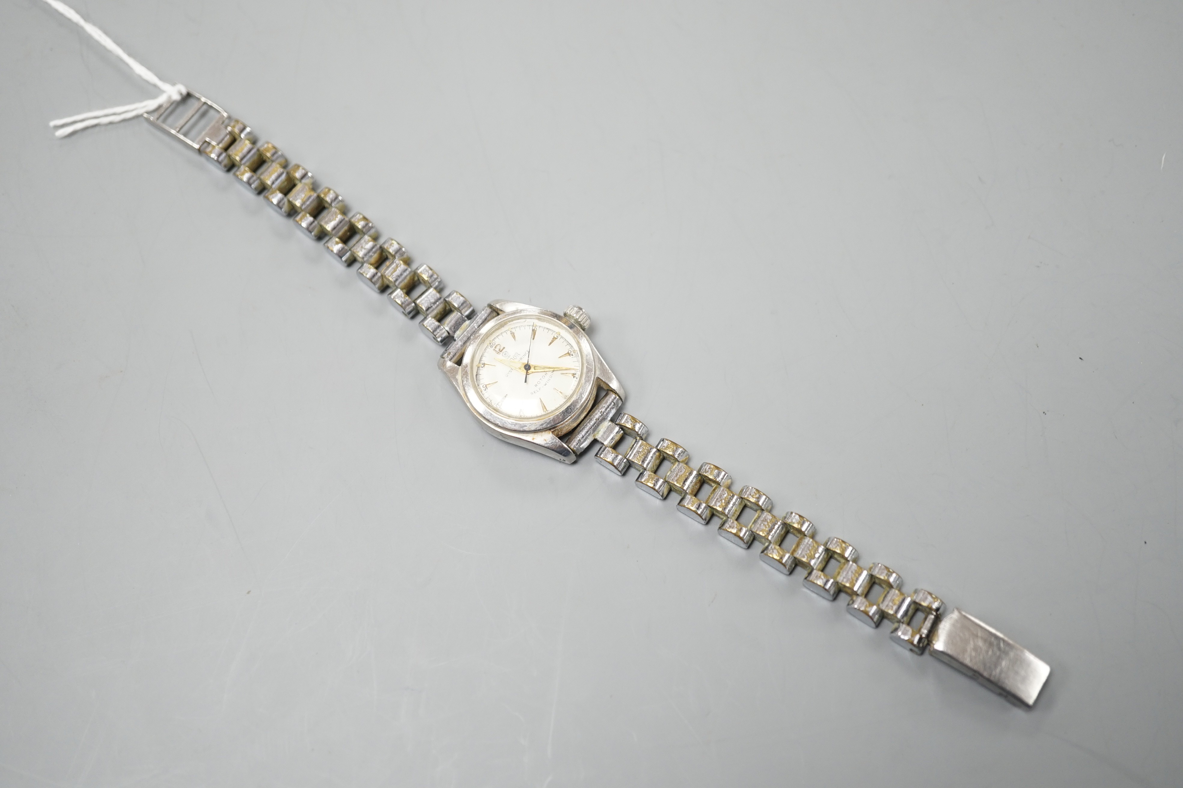 A lady's 1960's? stainless steel Tudor Oyster Prince self-winding wrist watch, on associated stainless steel bracelet, case diameter 25mm.